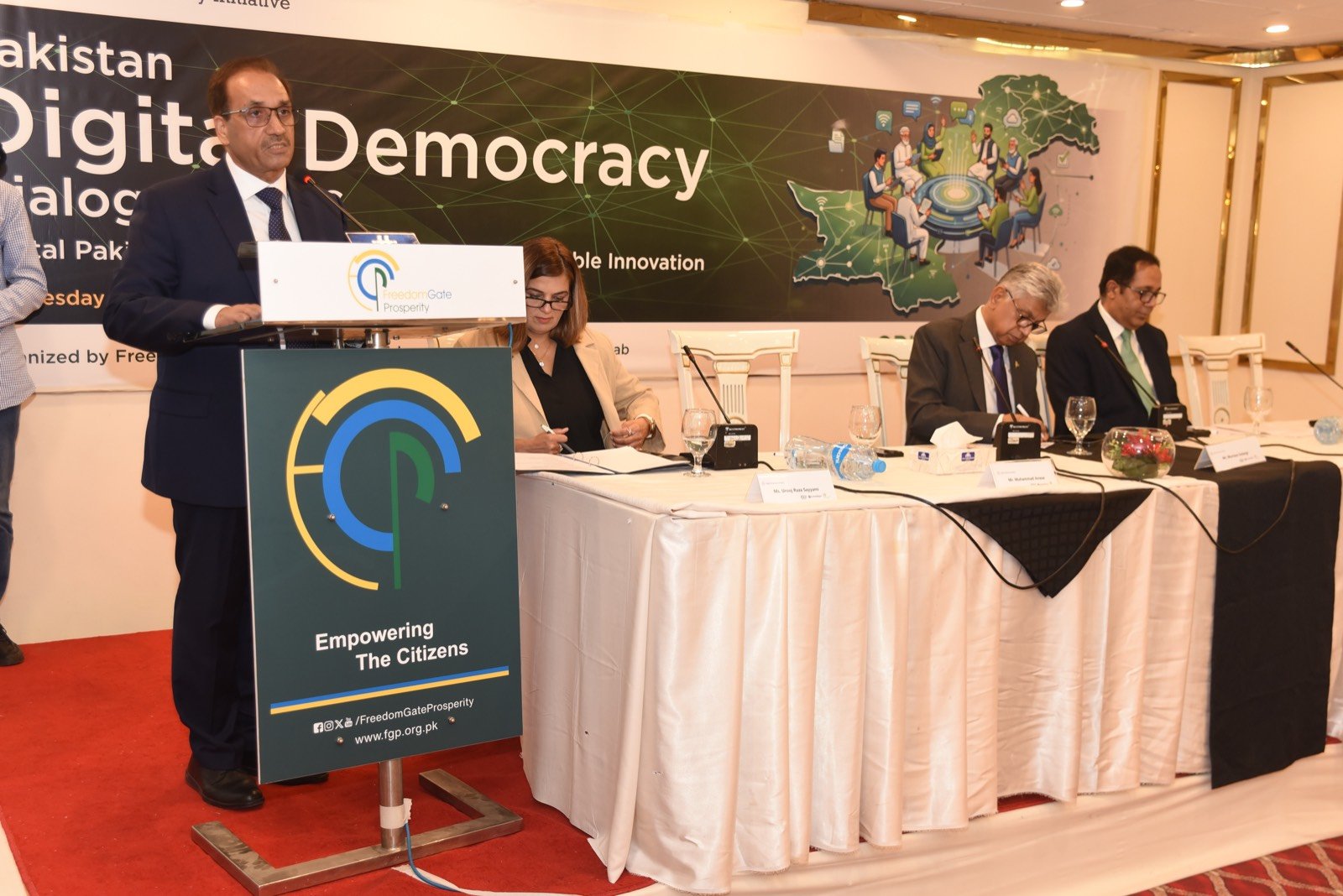A speaker addressing the Pakistan Digital Democracy Dialogue 2026 from the podium
